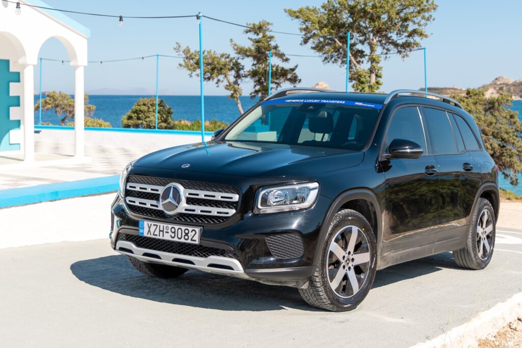 Black Mercedes SUV for premium private transfers in Milos