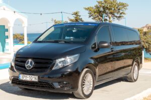 Black Mercedes van for private island routes in Milos