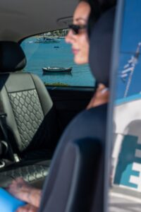 Hemeros Transfers vehicle and Milos coastal scenery