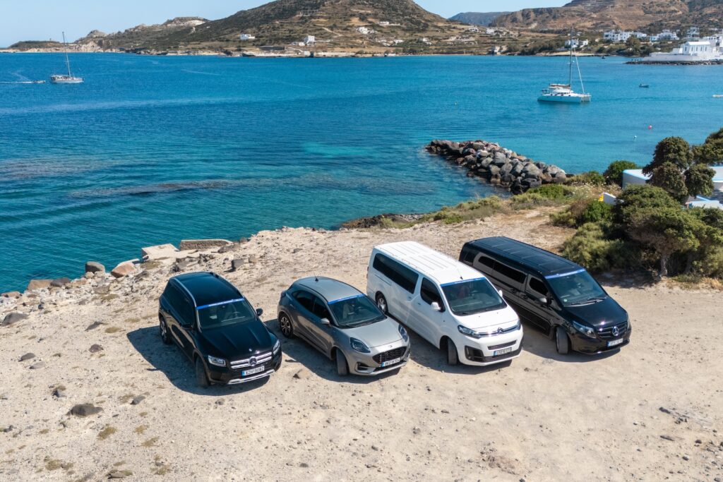 Premium Hemeros transfer vehicles on the Milos waterfront